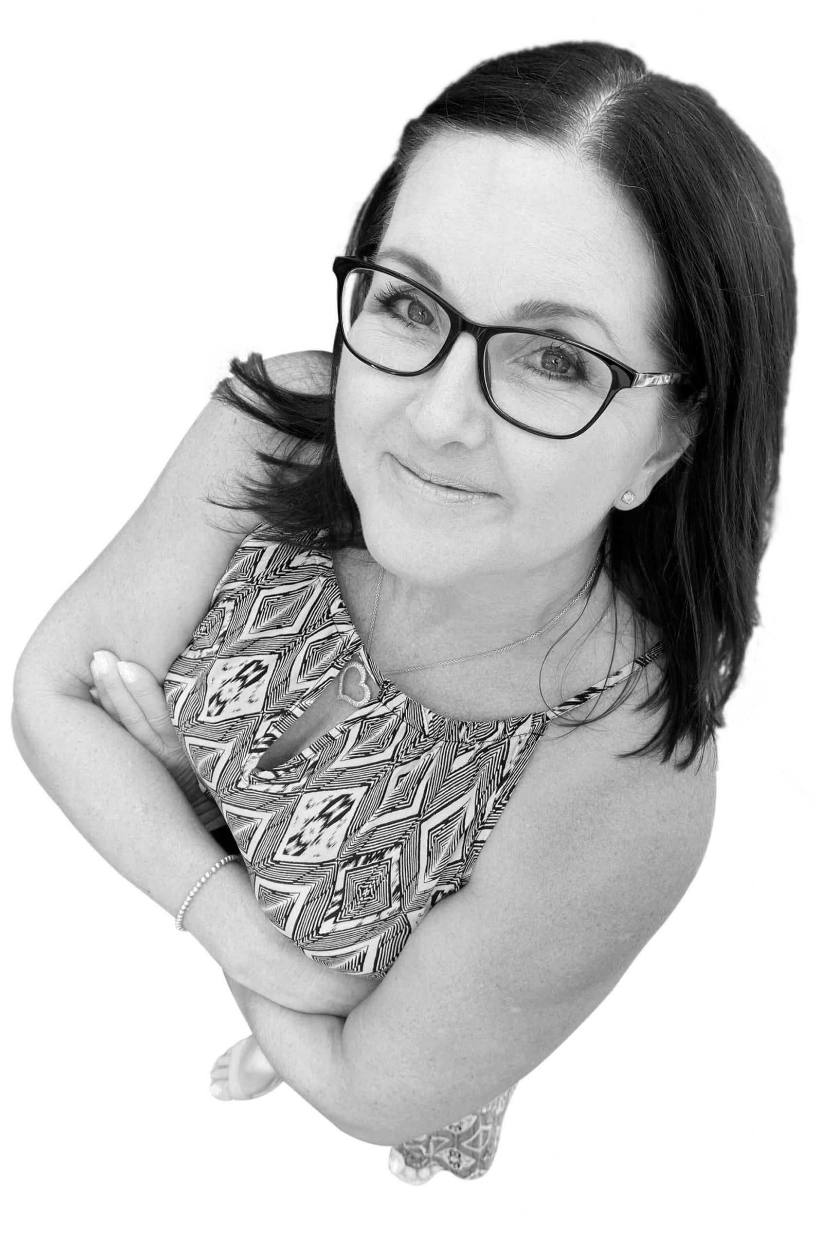 Icon Web Design Adelaide. Arial image of the business owner Tina Danher-Hart standing with her arms crossed.