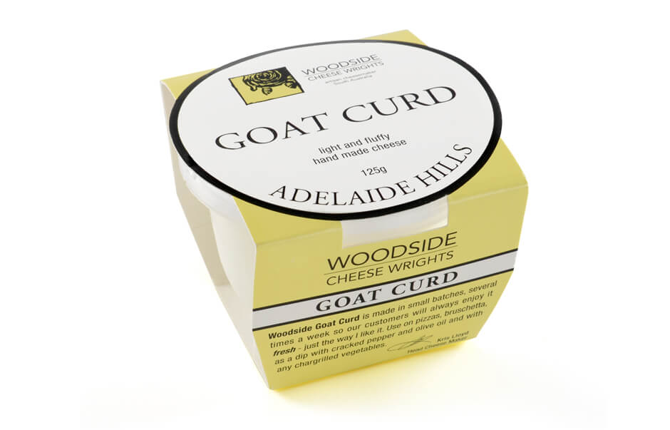 Icon Graphic Design - Label and packaging design Adelaide image of a Woodside Cheese Goat Curd tub cardboard wrap.