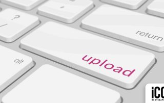 Icon Graphic Design Adelaide Blog - What is Website Hosting image of a white Apple keyboard with the word 'upload' in pink instead of the word enter.