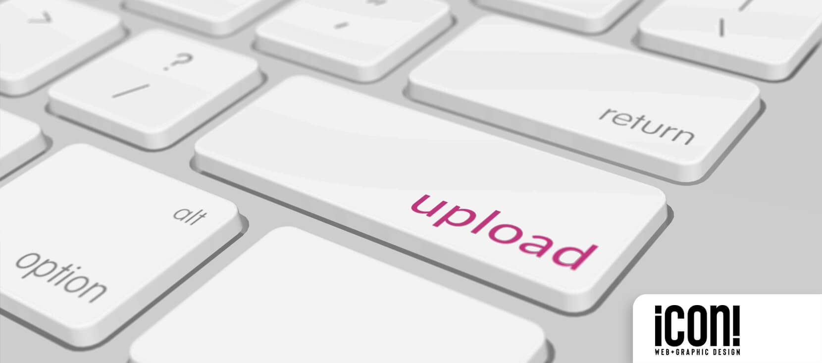 Icon Graphic Design Adelaide Blog - What is Website Hosting image of a white Apple keyboard with the word 'upload' in pink instead of the word enter.